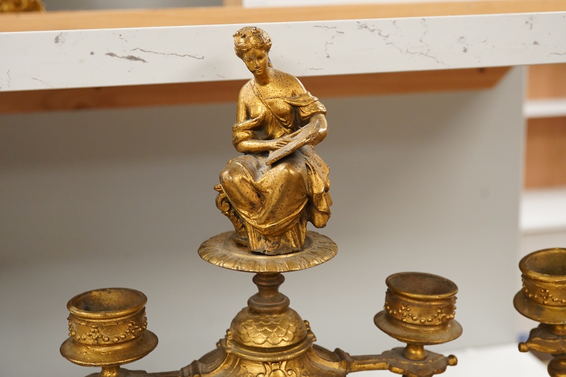 A pair of late 19th century French ormolu candlesticks, 37cm